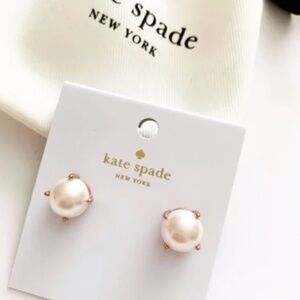 kate spade rose gold pearl studs.
